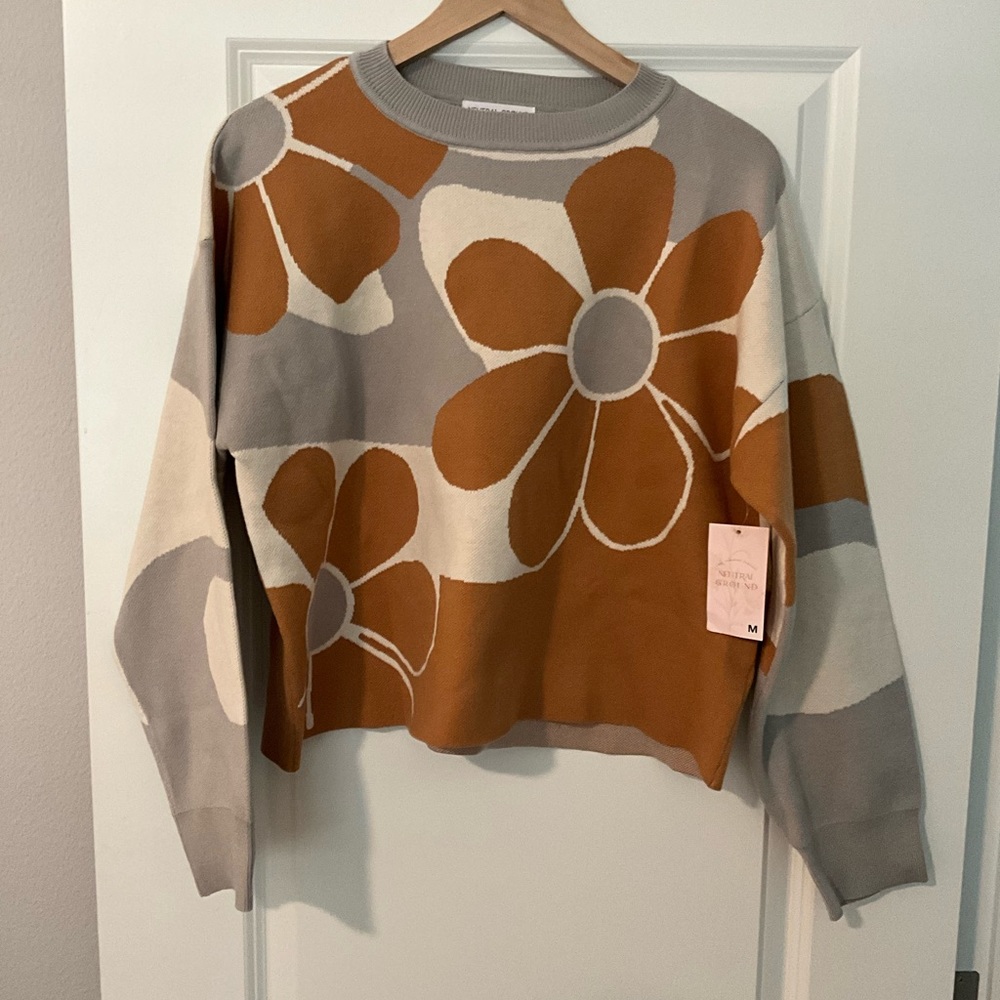 Neutral Ground flowered sweater.